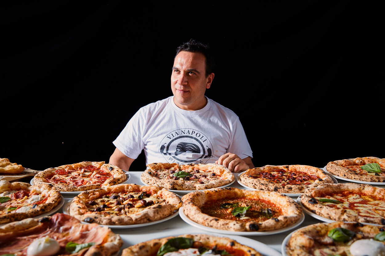 Via Napoli's Owner Luigi Esposito With Pizzas