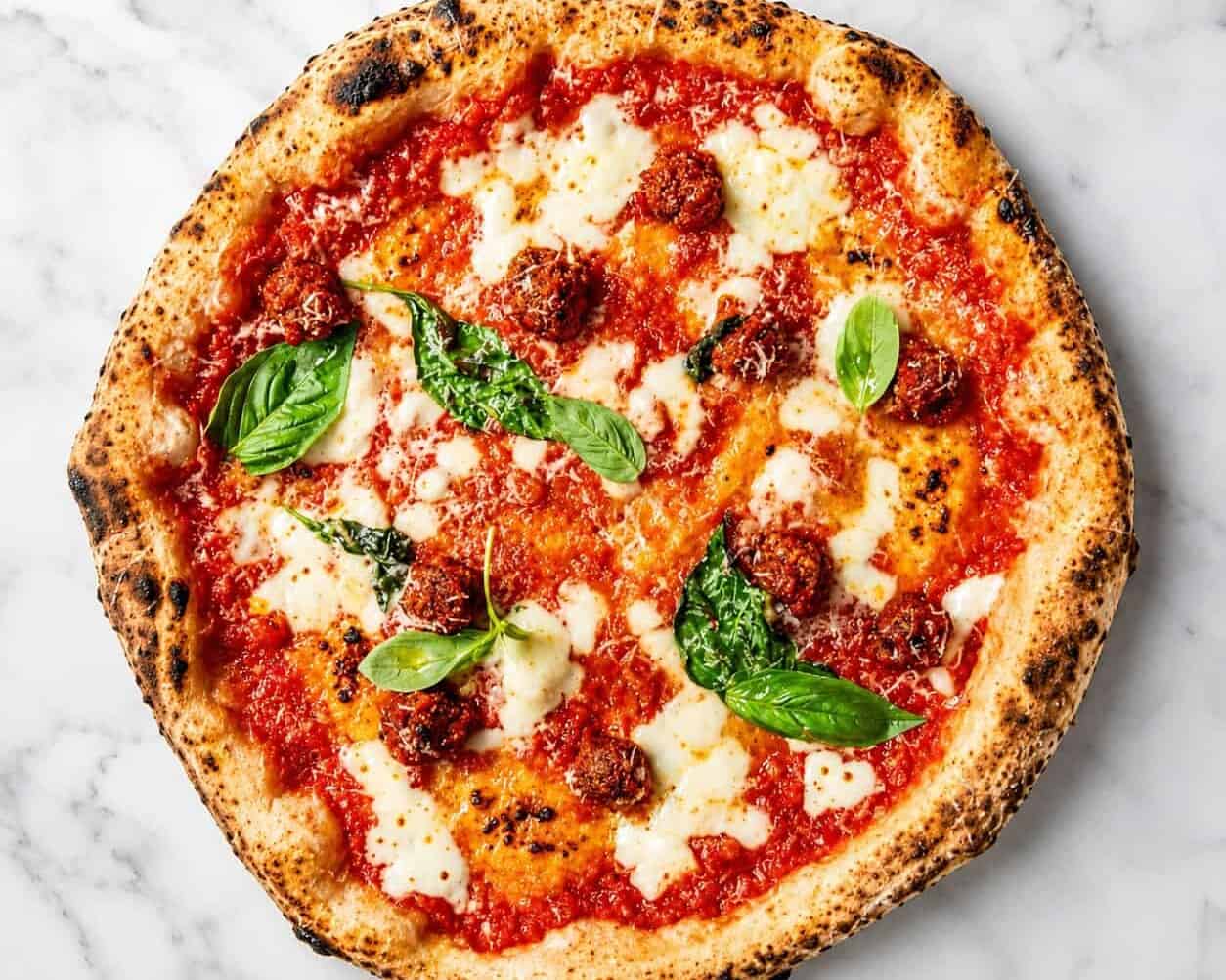Allegra Pizza - Solania San Marzano, Fior di Latte, Nonna Giuseppina’s Beef Meatballs, Pecorino Romano, Pepper, Basil, EVOO