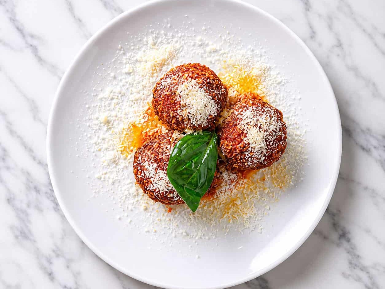 Arancini Bolognese - Slow Cooked Veal & Pork Bolognese, Peas, Buffalo Mozzarella