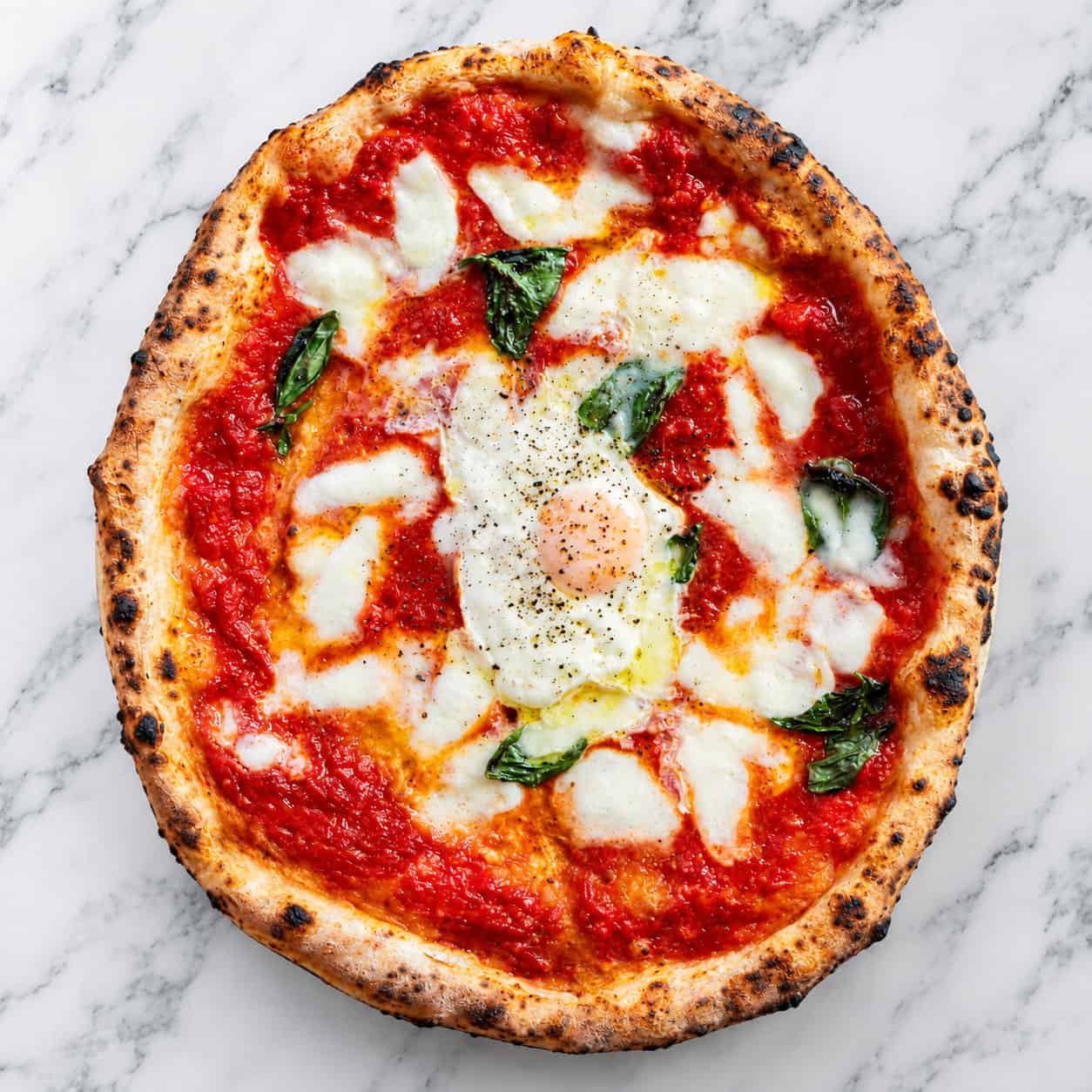 Bismarck Pizza - Solania San Marzano, Fior di Latte, Pecorino Romano, Sunny Side Up Egg, Basil, Levante EVOO from Andria