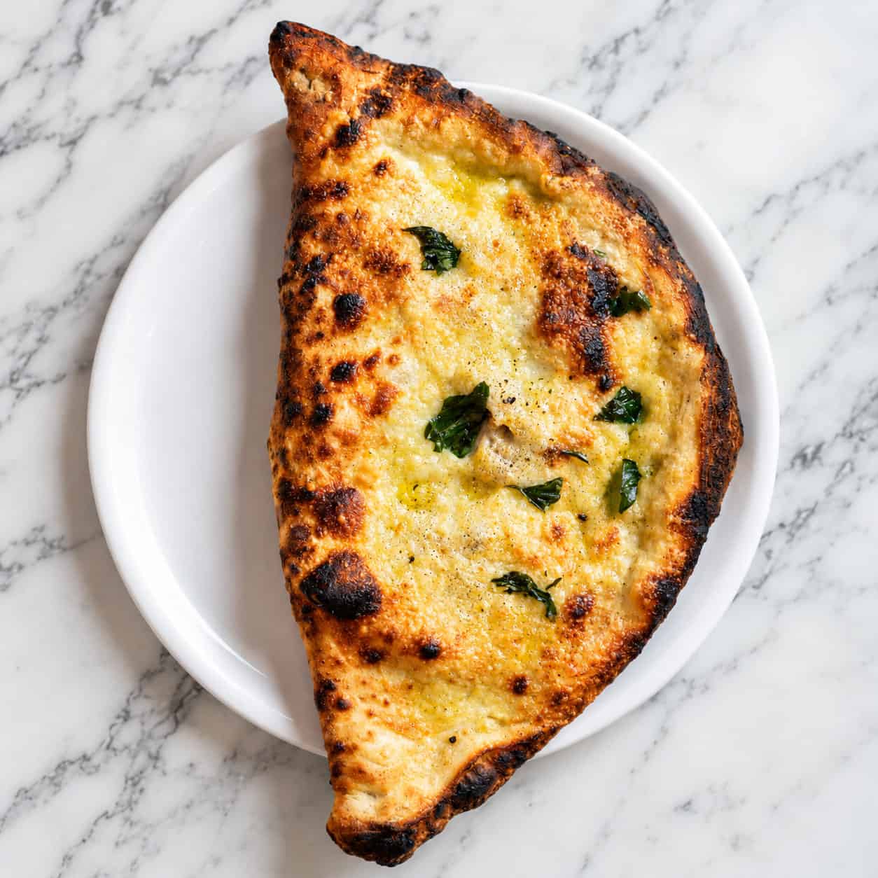 Calzone Bella ‘Mbriana - Fior di Latte, Free Range Pork Sausage, Friarielli (Broccoli Rabe), Smoked Provola Cheese, Chilli, Basil, Levante EVOO from Andria