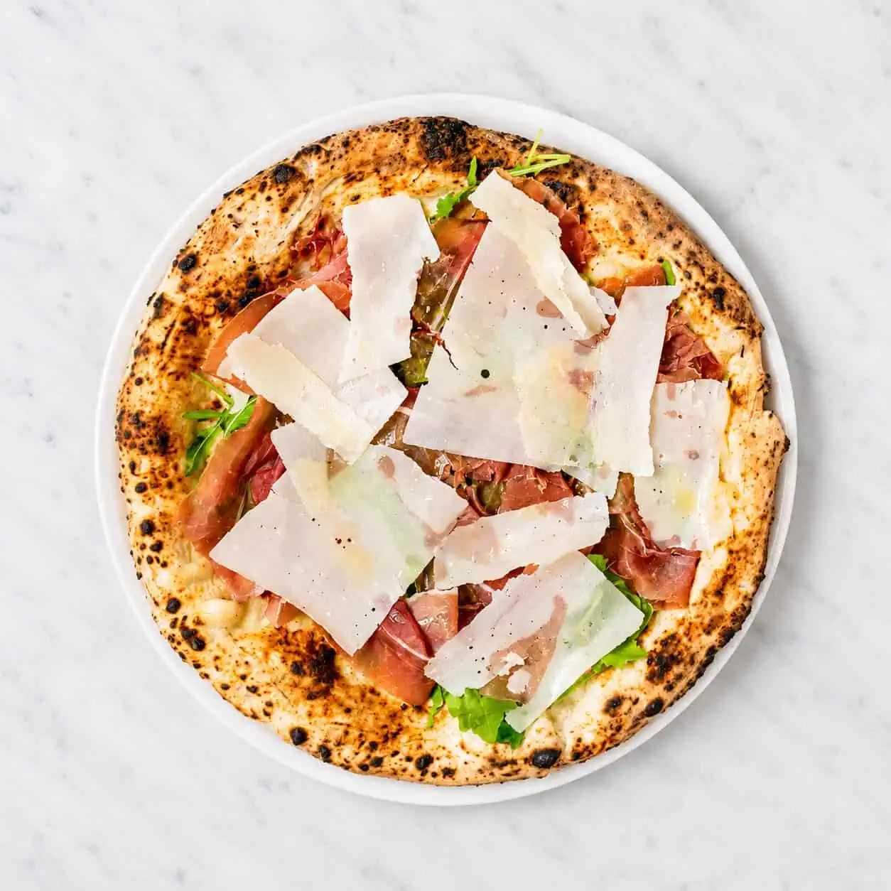 Crudo e Rucola - White base, Fior di Latte, Rocket, Prosciutto di Parma, Grana Padano DOP, EVOO