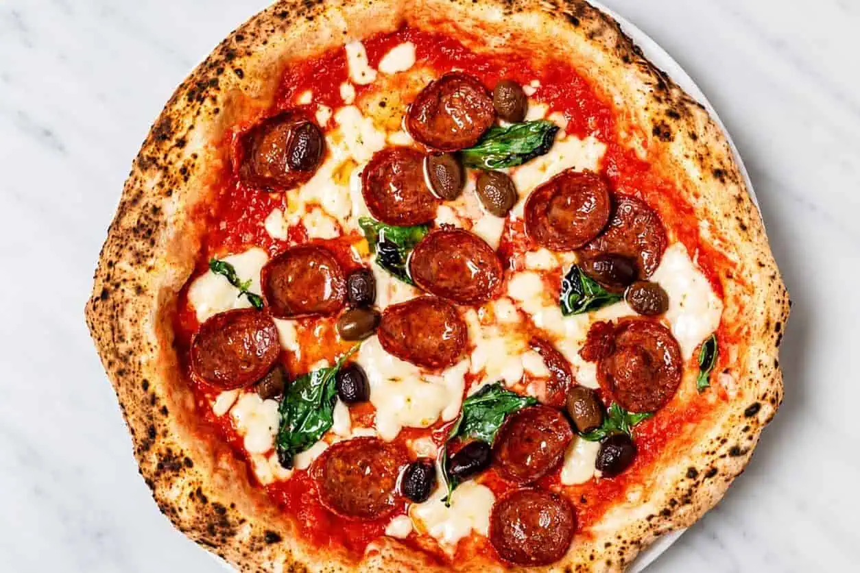 Diavola Pizza - Solania San Marzano, Fior di Latte, Hot Salami, Gaeta Black Olives, Pecorino Romano, Basil, EVOO