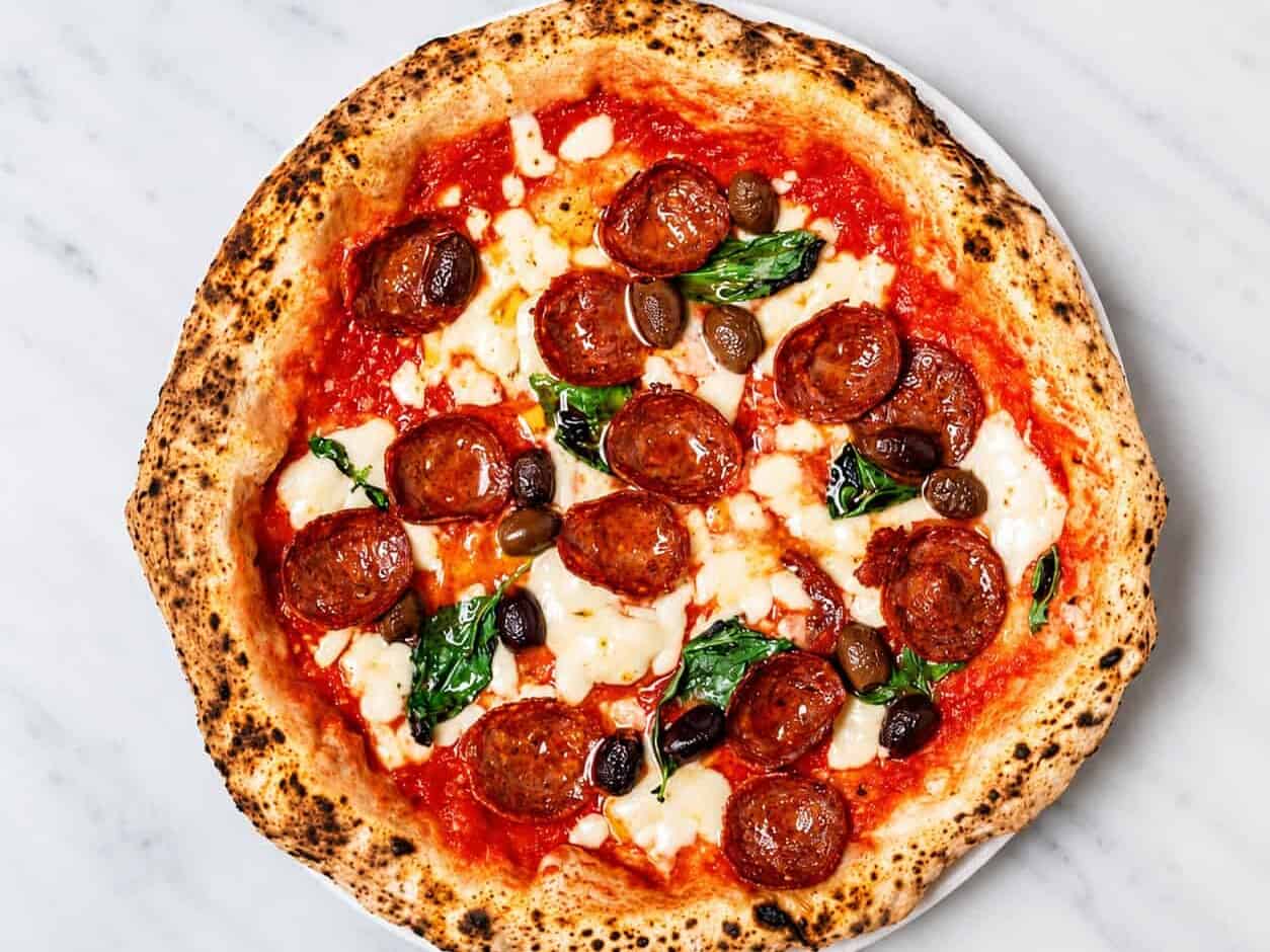 Diavola Pizza - Solania San Marzano, Fior di Latte, Hot Salami, Gaeta Black Olives, Pecorino Romano, Basil, EVOO