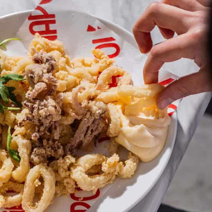 Crispy flash-fried locally sourced calamari served with a side of zesty lemon mayo