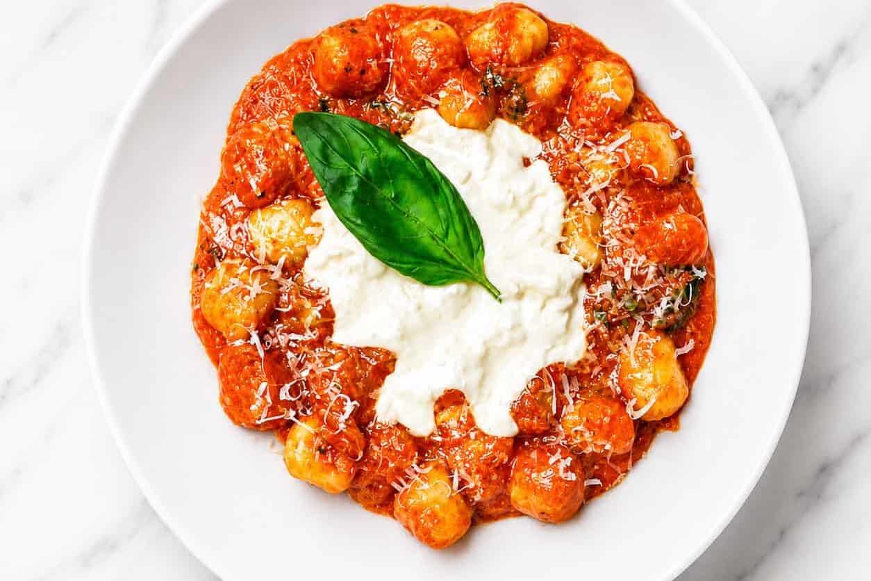 Gnocchi Sorrentina - Homemade Gnocchi, San Marzano Tomatoes, Melted Buffalo Mozzarella, Grana Padano DOP, Basil, EVOO