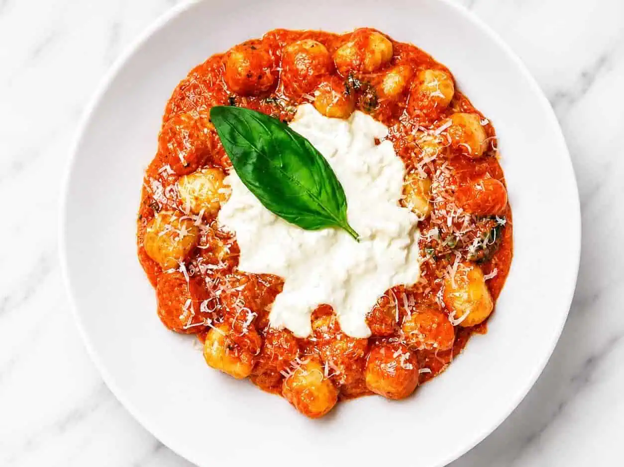 Gnocchi Sorrentina - Homemade Gnocchi, San Marzano Tomatoes, Melted Buffalo Mozzarella, Grana Padano DOP, Basil, EVOO