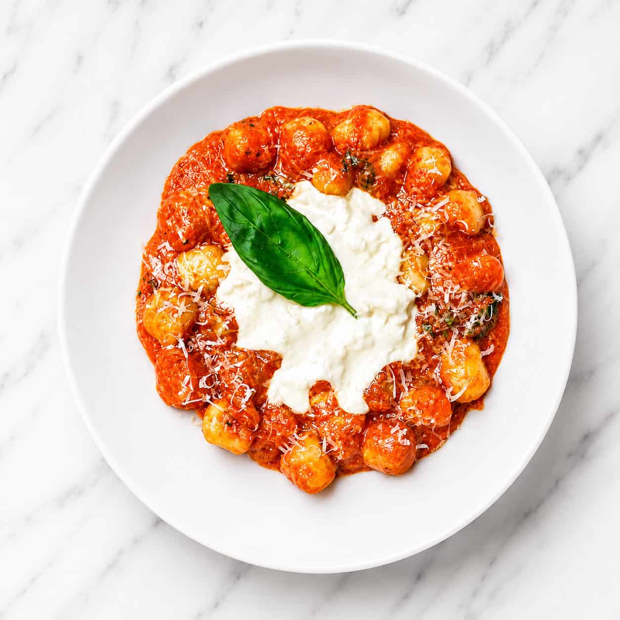 Gnocchi Sorrentina - Homemade Gnocchi, San Marzano Tomatoes, Melted Buffalo Mozzarella, Grana Padano DOP, Basil, EVOO