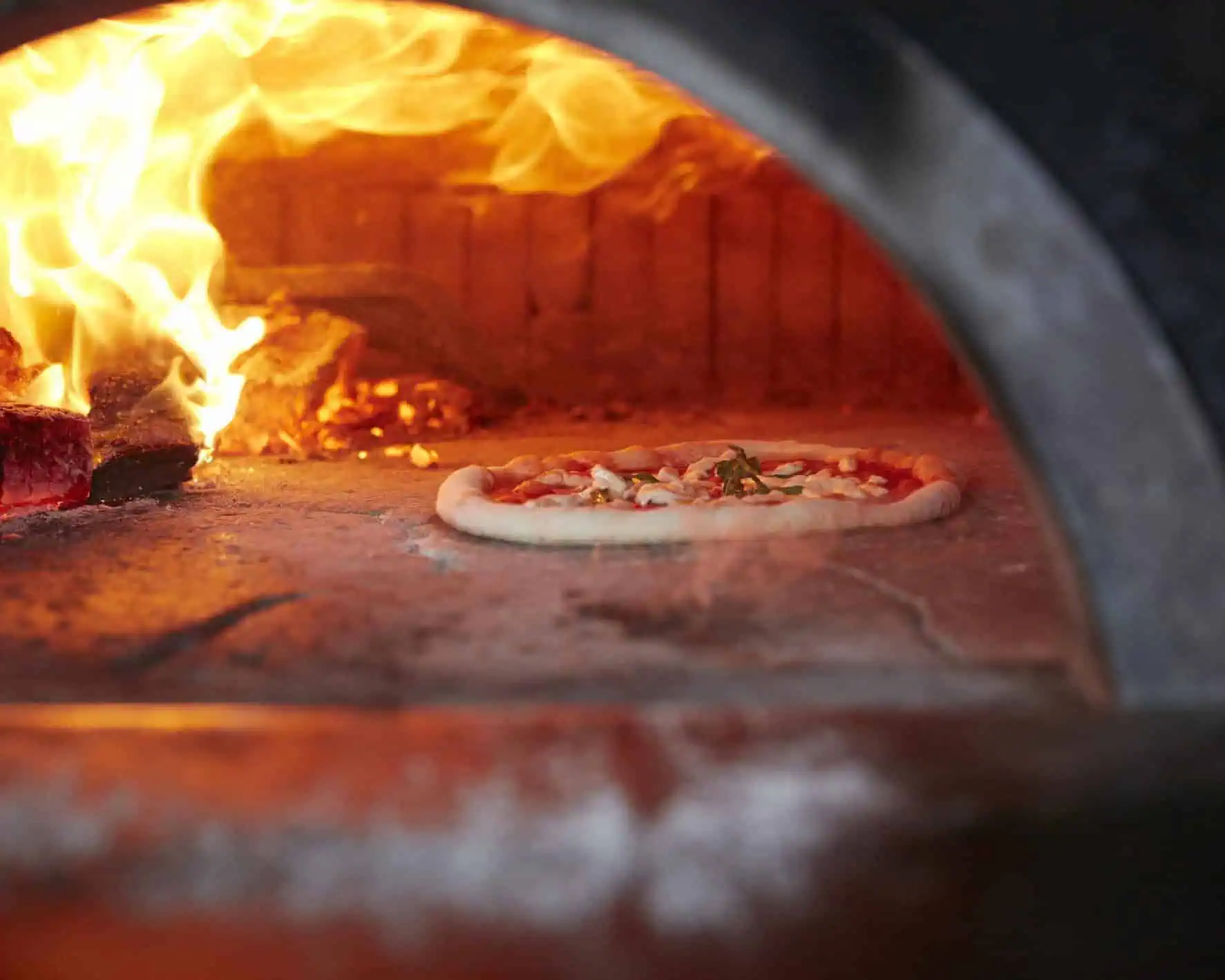 Neapolitan pizza wood fired oven baking Via Napoli
