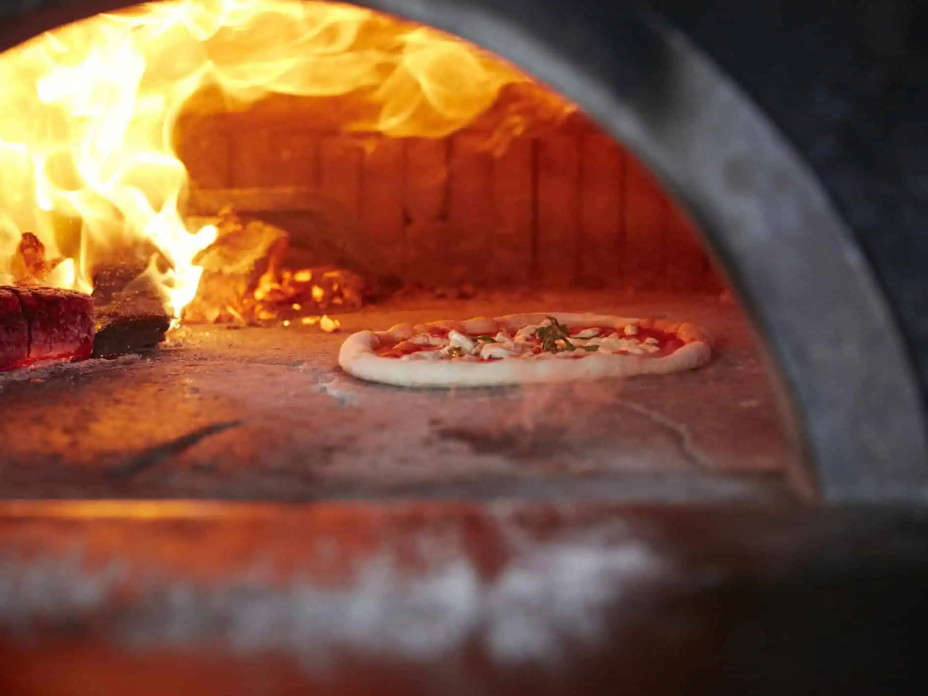 Neapolitan pizza wood fired oven baking Via Napoli