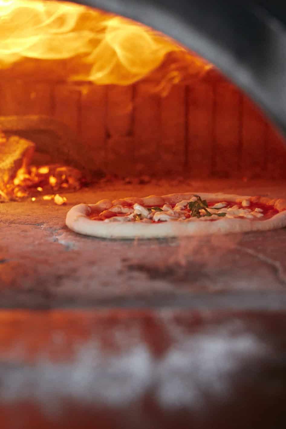Neapolitan pizza wood fired oven baking Via Napoli