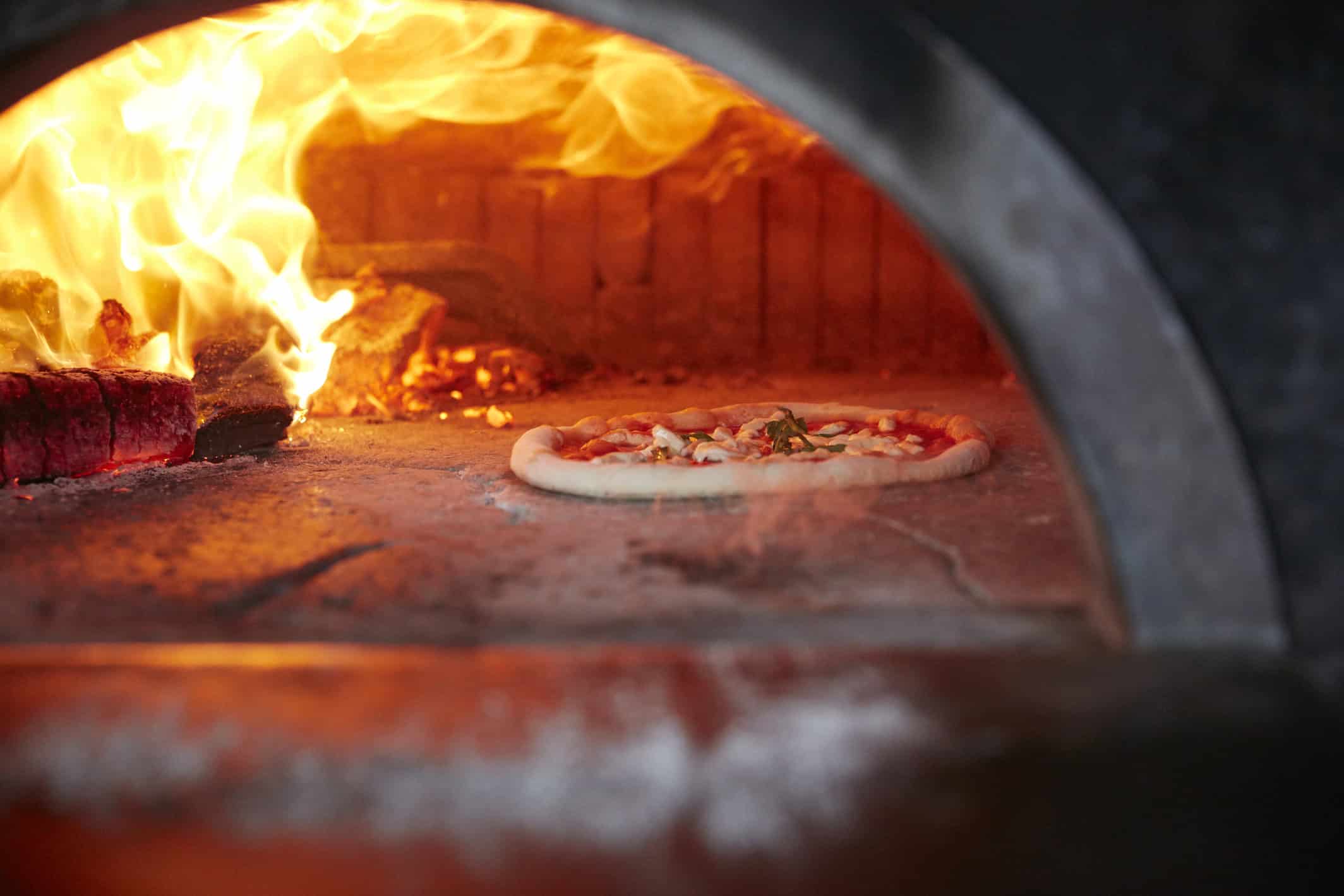 Neapolitan pizza wood fired oven baking Via Napoli