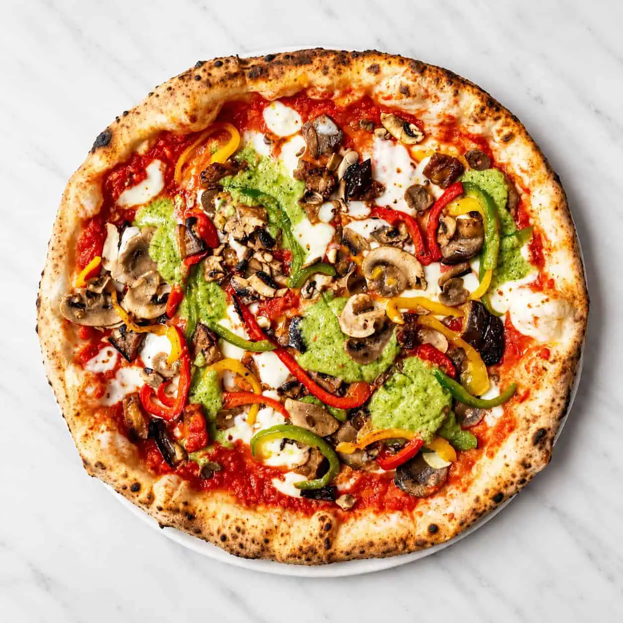 Ortolana Pizza - Solania San Marzano, Fior di Latte, Zucchini, Eggplant, Mushrooms, Grana Padano DOP, Gaeta Black Olives, Basil, EVOO. Swap for Vegan Cheese