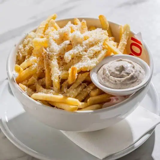 Crispy fries topped with shaved truffle pecorino cheese