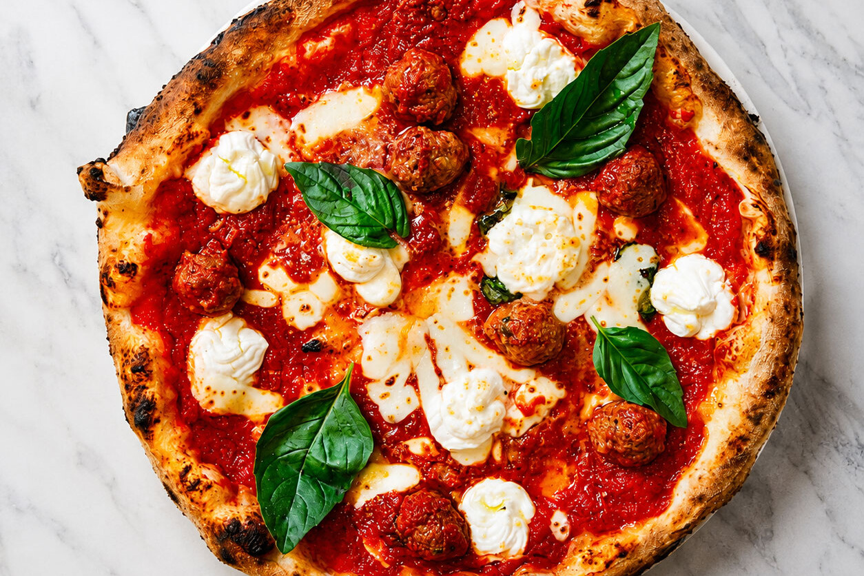 Pizza Lasagna - Solania San Marzano, Fior di Latte, Buffalo Ricotta, Nonna Giuseppina&rsquo;s Beef Meatballs, Pecorino Romano, Basil, EVOO