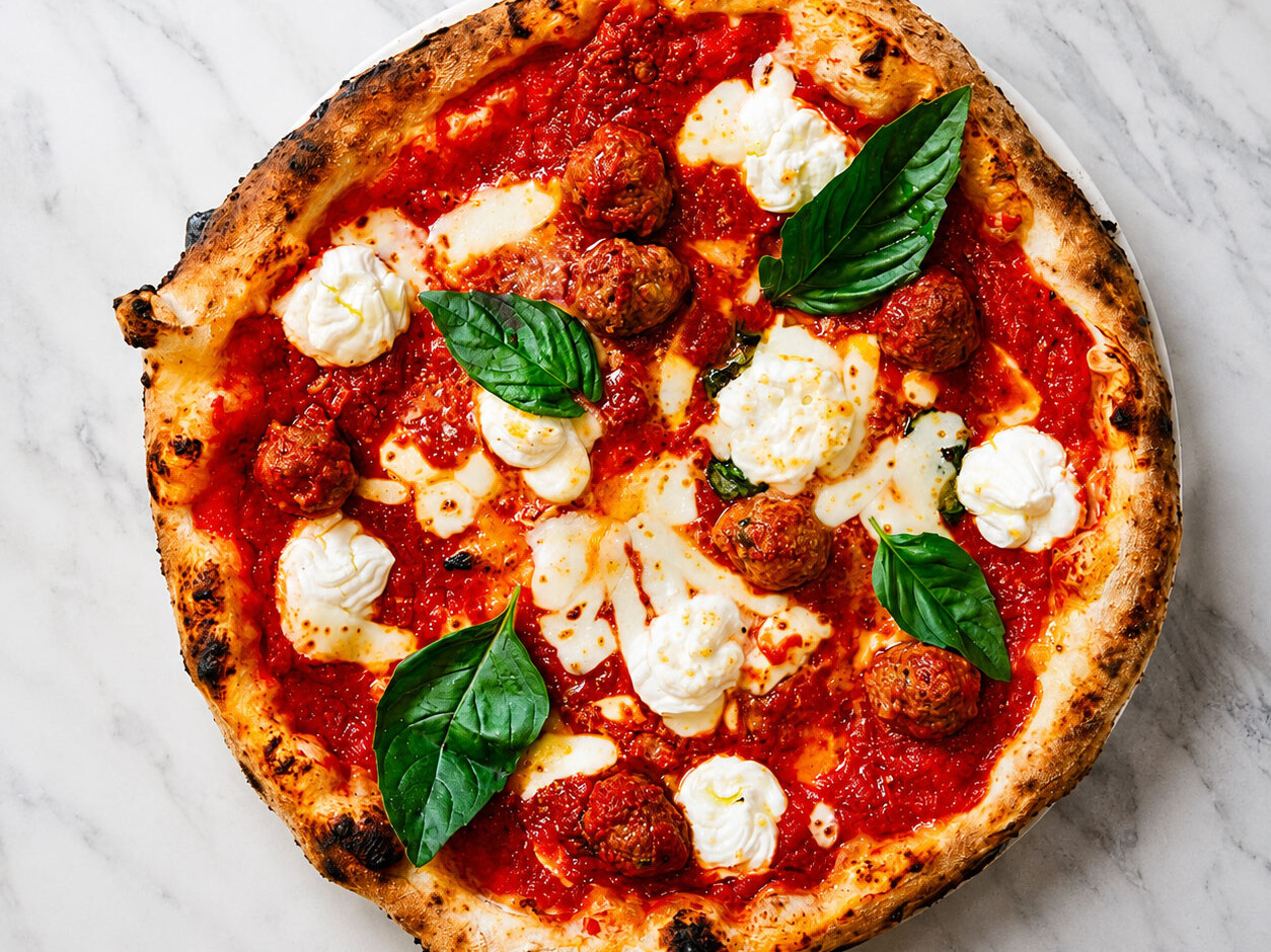 Pizza Lasagna - Solania San Marzano, Fior di Latte, Buffalo Ricotta, Nonna Giuseppina’s Beef Meatballs, Pecorino Romano, Basil, EVOO