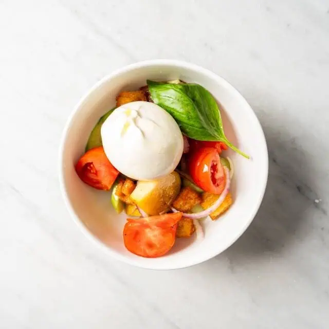 Vine-Riped Tomatoes, Cucumber, Green Olives, Spanish Onions, Croutons, Burrata, Extra Virgin Olive Oil, Oregano, Basil
