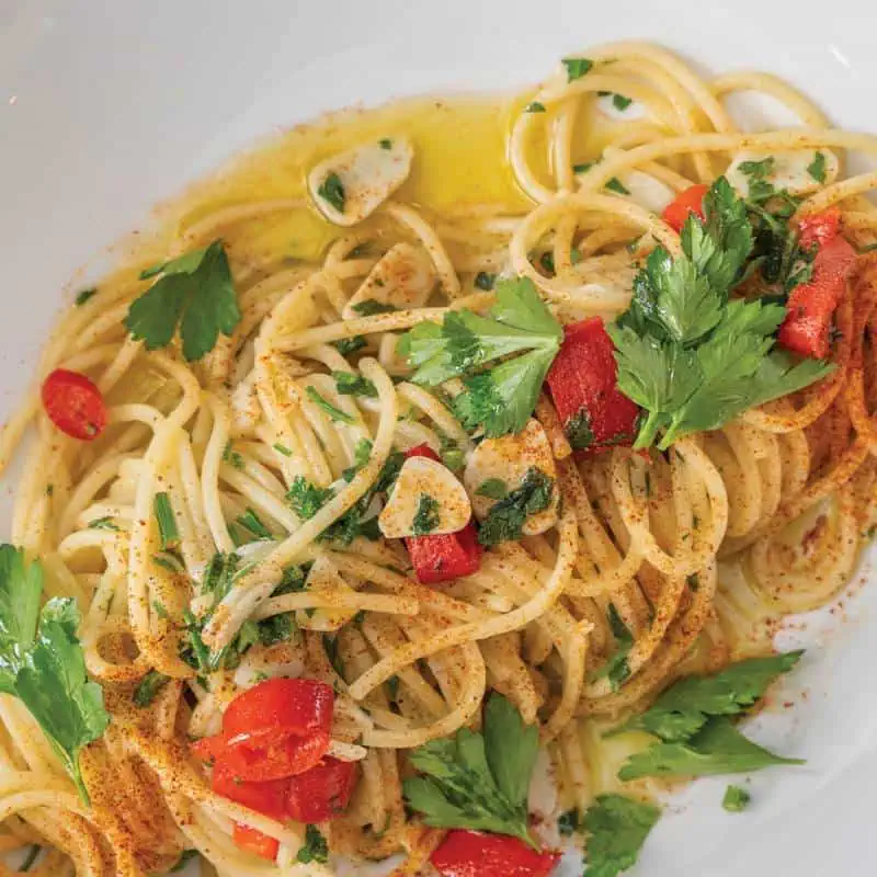Classic Italian spaghetti aglio, olio e peperoncino with garlic, chilli, and extra virgin olive oil