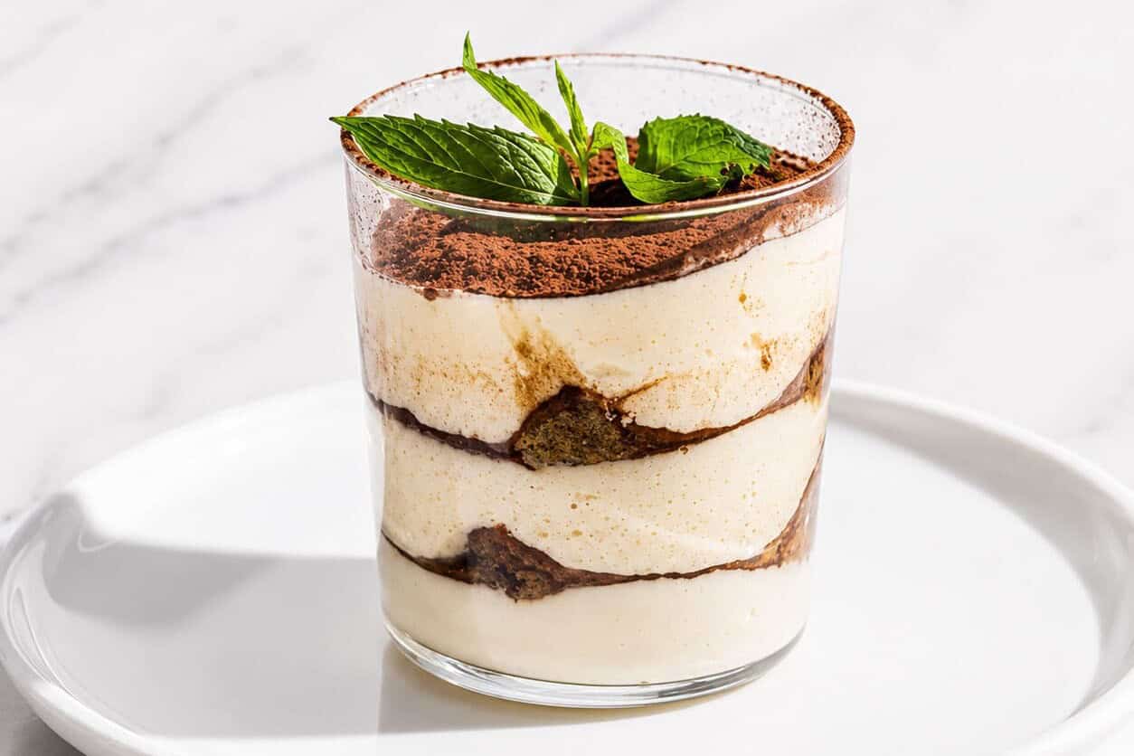 Tiramisú - Creamy Dessert of Espresso-soaked Ladyfingers surrounded by Lightly Sweetened Mascarpone