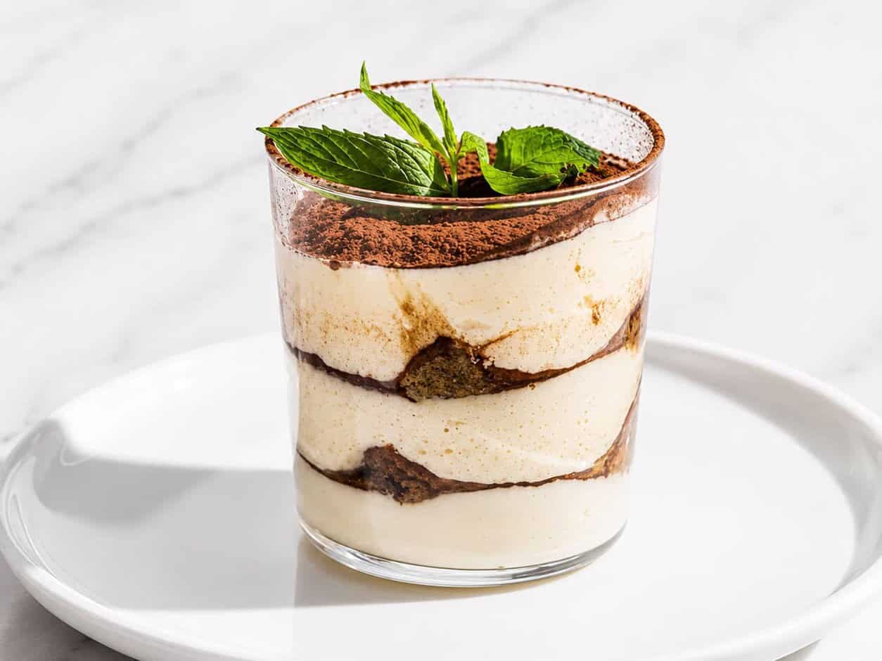 Tiramisú - Creamy Dessert of Espresso-soaked Ladyfingers surrounded by Lightly Sweetened Mascarpone