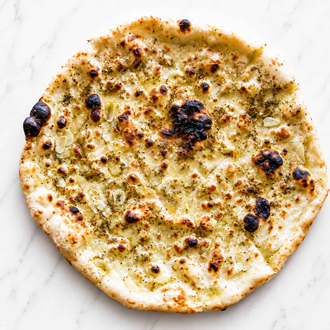 Wood-Fired Crust - Confit Garlic, Rosemary, Oregano, EVOO or Confit Garlic, Oregano, Buffalo Mozzarella